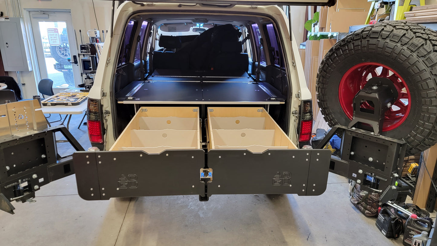 Land Cruiser 80 Series LX450 with dual drawers and sleeping platform for vehicle storage.