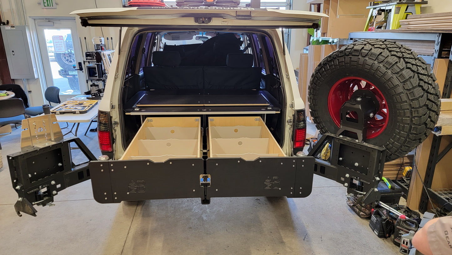 Land Cruiser 80 Series LX450 with dual drawers and sleeping platform for vehicle storage.