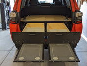 5th Gen 4Runner with dual lockable drawers and slide out tables added for vehicle organization 