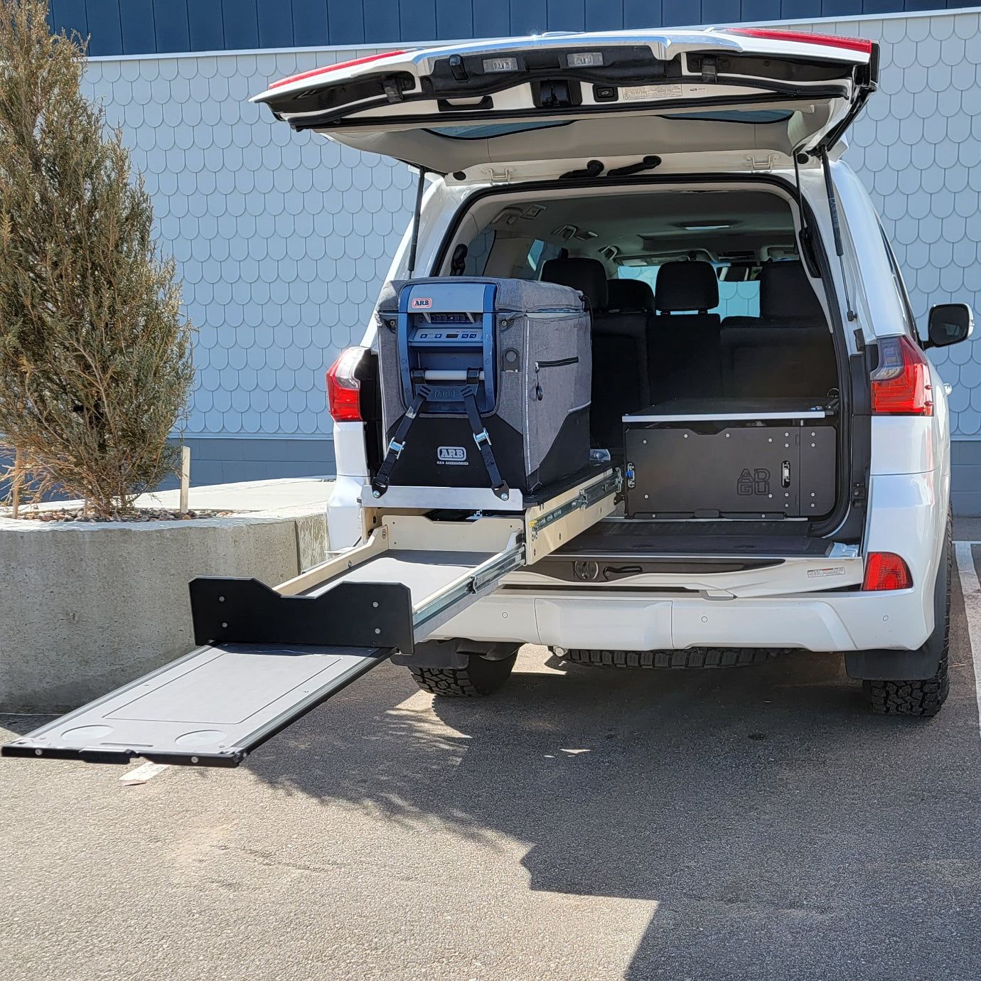 Toyota 4Runner Kitchen, Fridge Slide , work surface, storage drawers and sleeping platform . Organization for overland adventure.
