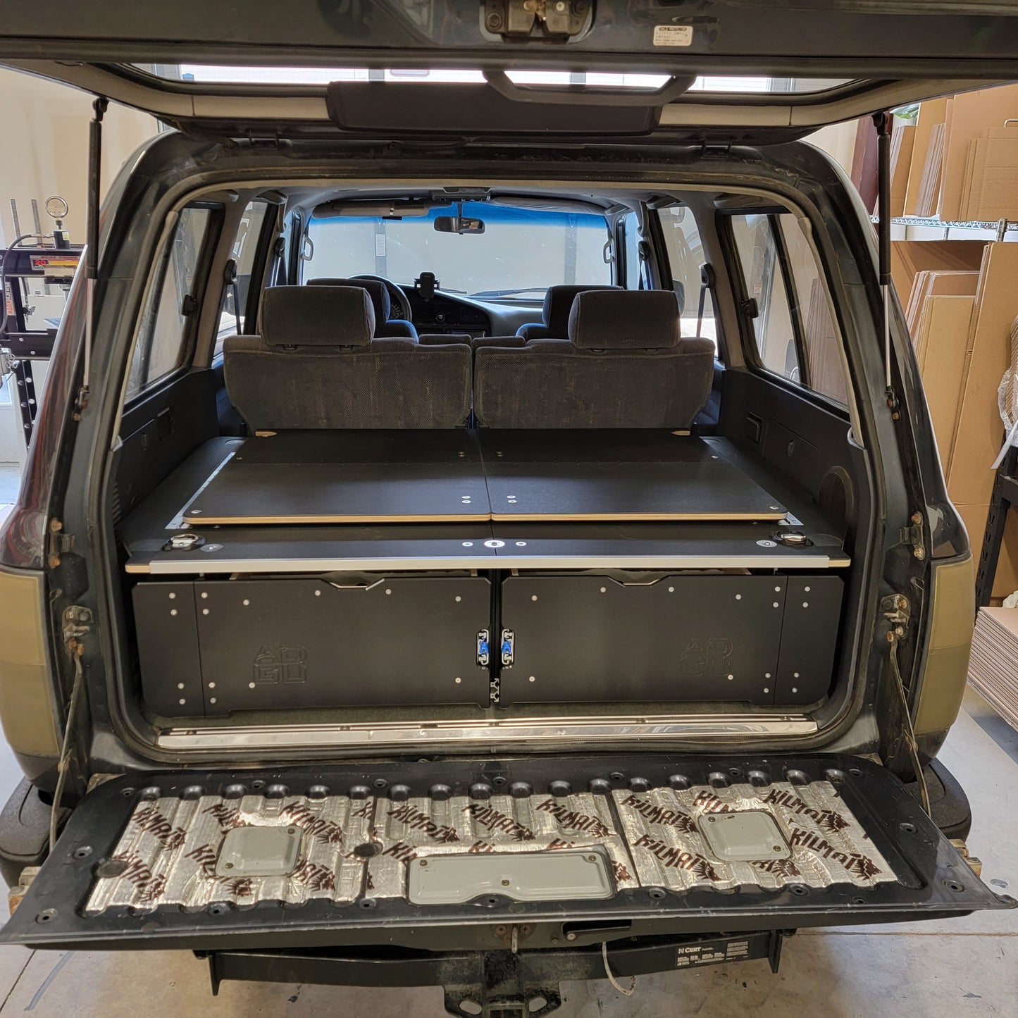 80 Series Toyota Landcruiser drawer system with sleeping platform for vehicle organization