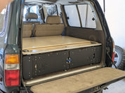 80 Series Toyota Landcruiser drawer system with sleeping platform for vehicle organization