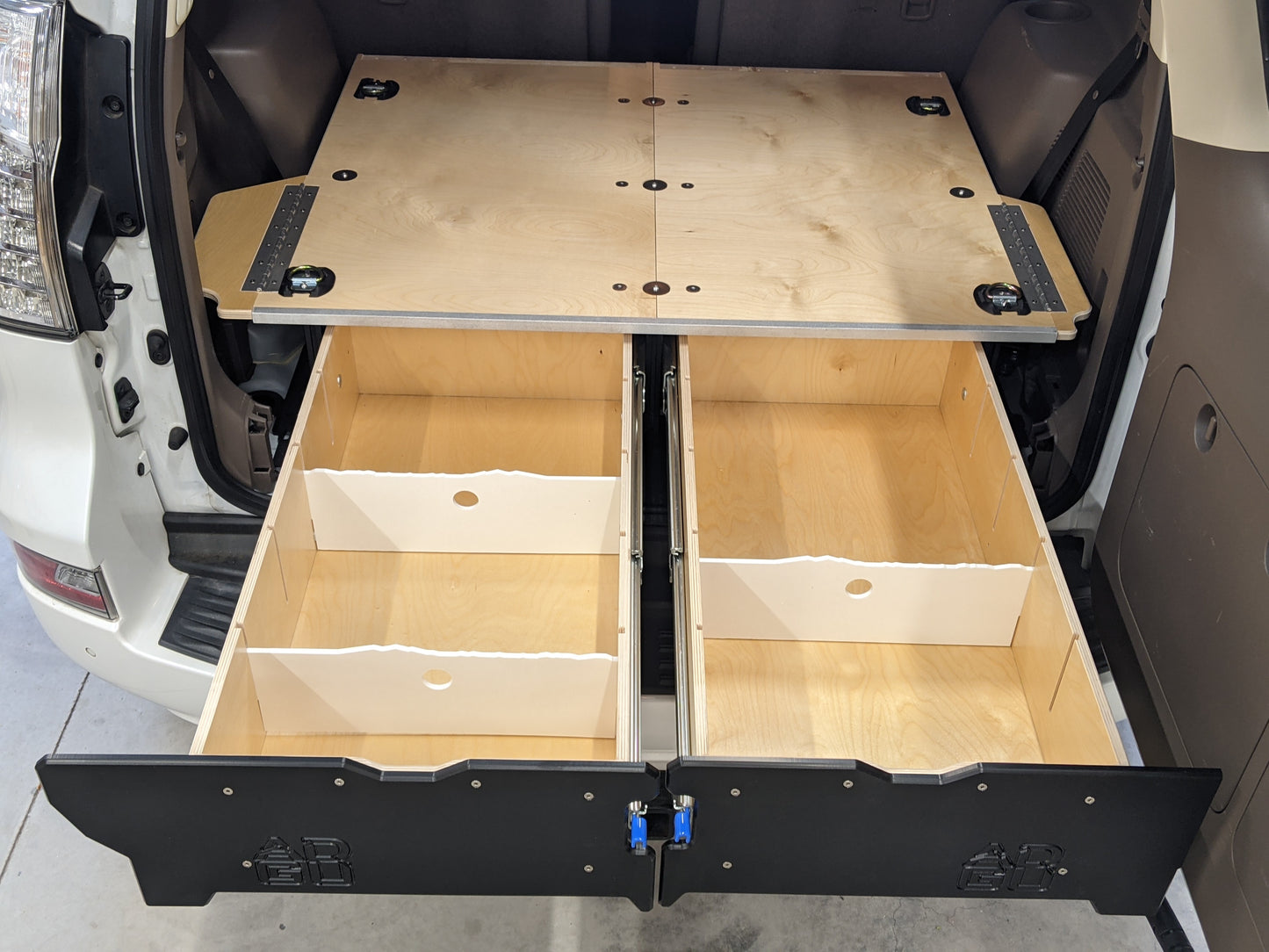 GX460 drawer system with sleeping platform for vehicle organization