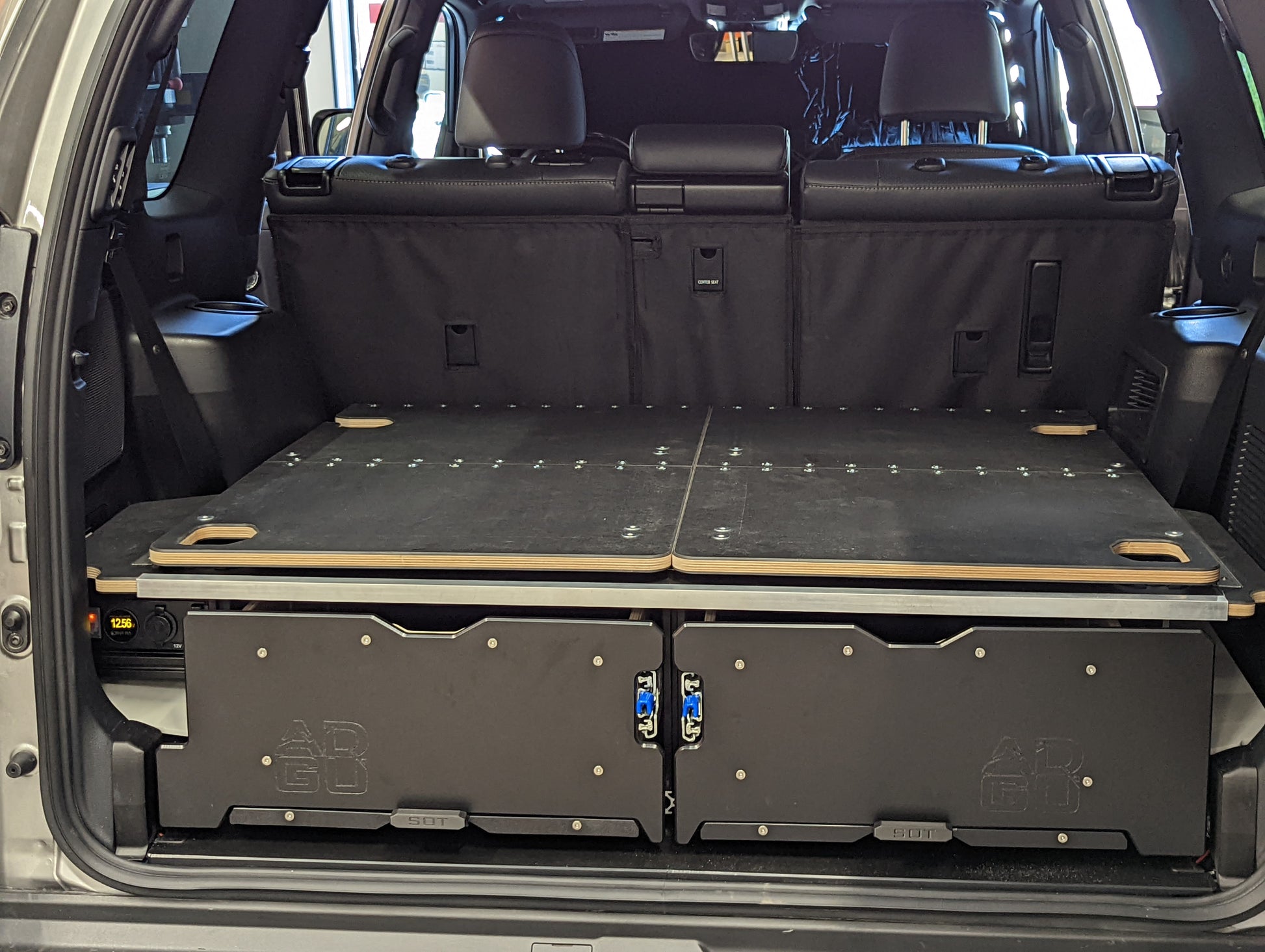GX460 drawer system with sleeping platform for vehicle organization